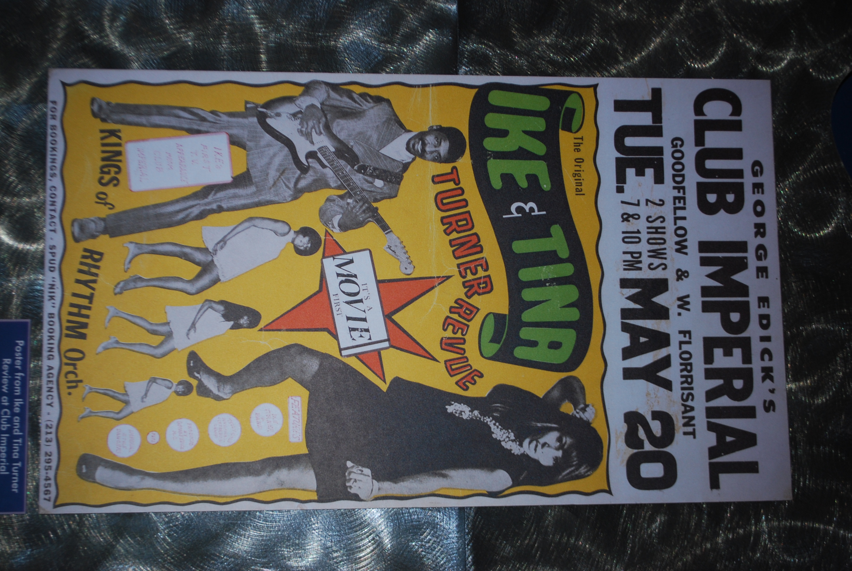 1960s style advertisement for the Ike and Tina Turner Revue. White and yellow background with Ike Turner dressed in a suit, no tie holding a guitar. Tina Turner to his right with long straight hair wearing a short dress. Three Ikettes in short white dresses below them. Poster reads 'George Edicks's Club Imperial, Goodfellow & W. Florrisant, Tue May 20, 2 Shows, 7 & 10 PM. The Original Ike & Tina Turner Revue.